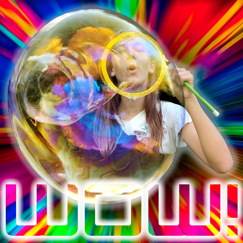 teenage girl blowing a big bubble